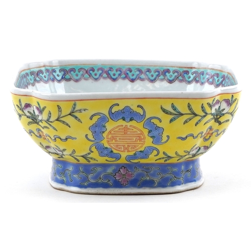 40 - Chinese porcelain footed bowl hand painted in the famille juan palette with bats and flowers, charac... 