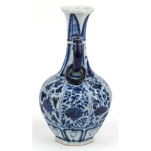 38 - Chinese porcelain blue and white twin handled vase hand painted with flowers and foliage, 27cm high.