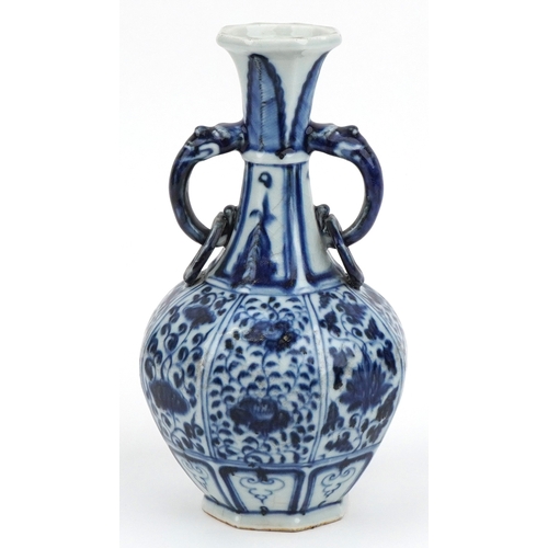 38 - Chinese porcelain blue and white twin handled vase hand painted with flowers and foliage, 27cm high.