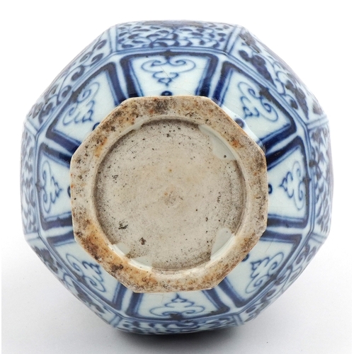 38 - Chinese porcelain blue and white twin handled vase hand painted with flowers and foliage, 27cm high.