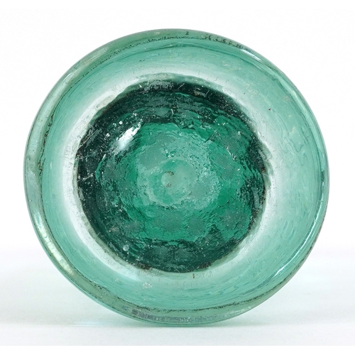 34 - Victorian green glass controlled bubble dump paperweight, 12cm high.