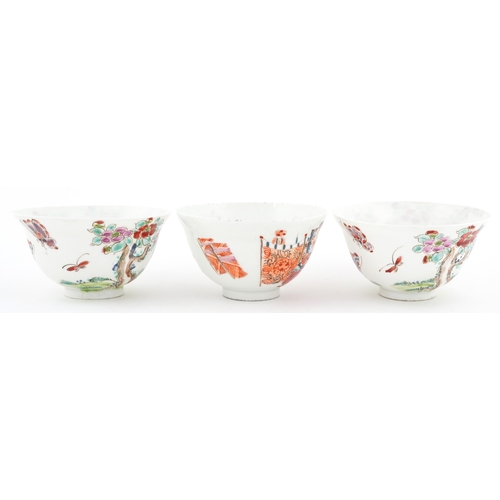 45 - Pair of Chinese porcelain rice bowls hand painted in the famille rose palette with insects amongst f... 
