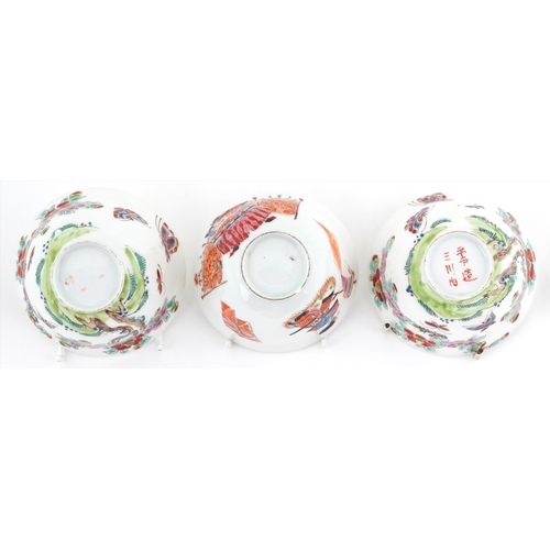 45 - Pair of Chinese porcelain rice bowls hand painted in the famille rose palette with insects amongst f... 