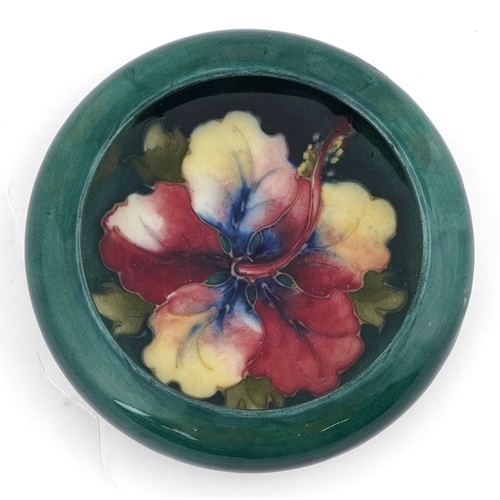 57 - Walter Moorcroft Hibiscus pattern pottery dish, 11cm high.