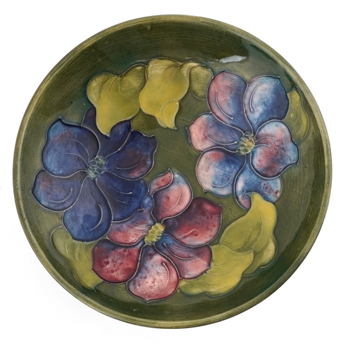 56 - Walter Moorcroft Clematis pattern pottery pedestal dish, 9cm high x 18cm in diameter.