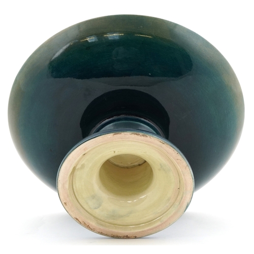 56 - Walter Moorcroft Clematis pattern pottery pedestal dish, 9cm high x 18cm in diameter.