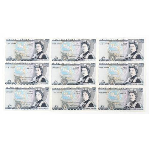 Nine 1980 Pictorial Series blue five pound notes, Chief Cashier D. H. F. Somerset, prefixes and serial numbers LY42 180043-LY42 180045, LY42 180047-LY42180050, KY85 198349 and NC81 989413, all in uncirculated condition.
