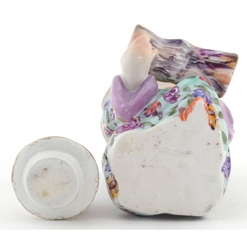 20 - 19th century Meissen style German porcelain inkwell modelled as a Chinese child with book, 9cm high.