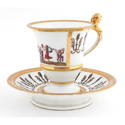 15 - 19th century French porcelain teacup and saucer having a figural handle, decorated with Neo-Classica... 