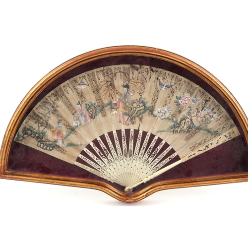 60 - Antique Chinese fan with bone guard pierced with foliage, hand painted with females in a garden sett... 