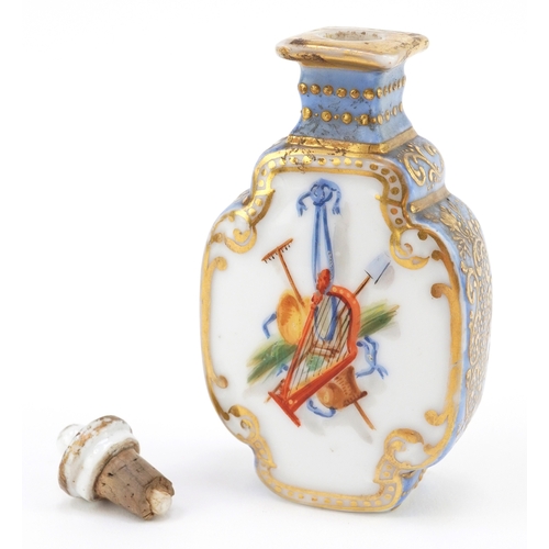 22 - Antique continental porcelain scent bottle hand painted with icons including a harp, having a floral... 