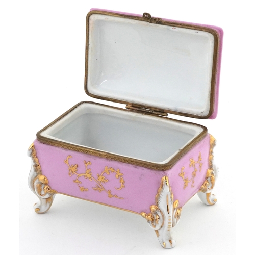 24 - Antique Meissen style porcelain jewellery casket hand painted onto a rose pink ground with gilded an... 