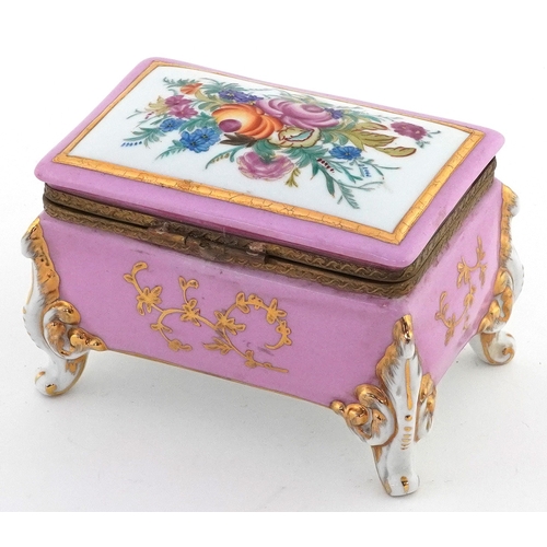 24 - Antique Meissen style porcelain jewellery casket hand painted onto a rose pink ground with gilded an... 