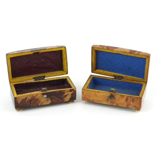 66 - Two antique tortoiseshell jewel boxes raised on bone feet, the largest 7cm wide.