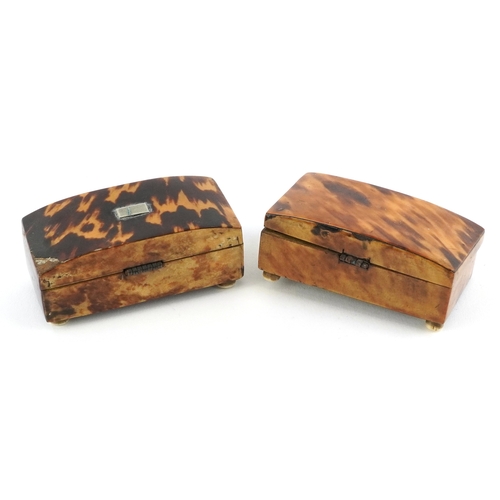 66 - Two antique tortoiseshell jewel boxes raised on bone feet, the largest 7cm wide.