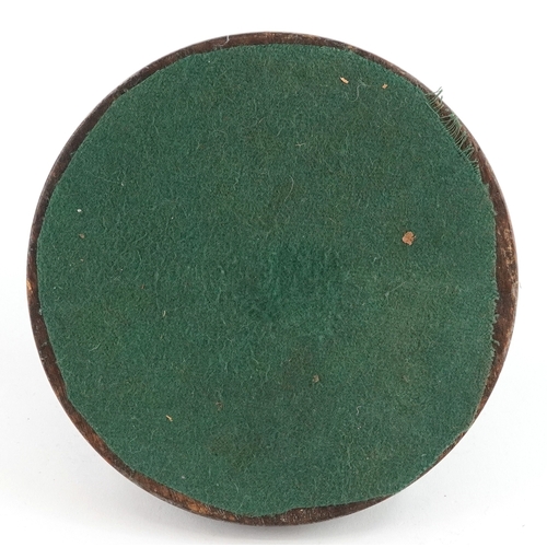 6 - Novelty cold painted inkwell in the form of a monkey, with glass liner, mounted on an oak base, 9cm ... 