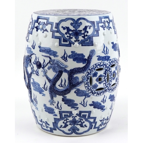 94 - Chinese export blue and white porcelain barrel garden seat hand painted and relief decorated with dr... 