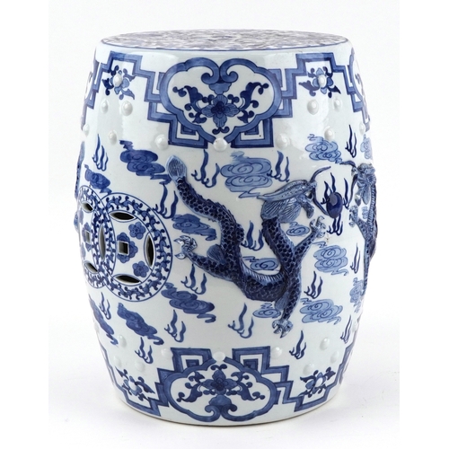94 - Chinese export blue and white porcelain barrel garden seat hand painted and relief decorated with dr... 