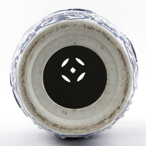 94 - Chinese export blue and white porcelain barrel garden seat hand painted and relief decorated with dr... 