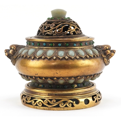 50 - Chinese patinated bronze censer and cover having applied cabochon green stones and Foo dog handles, ... 