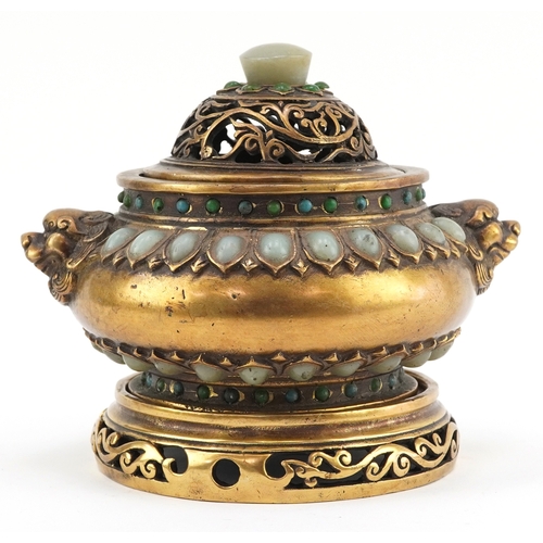 50 - Chinese patinated bronze censer and cover having applied cabochon green stones and Foo dog handles, ... 