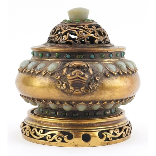 50 - Chinese patinated bronze censer and cover having applied cabochon green stones and Foo dog handles, ... 