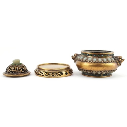 50 - Chinese patinated bronze censer and cover having applied cabochon green stones and Foo dog handles, ... 