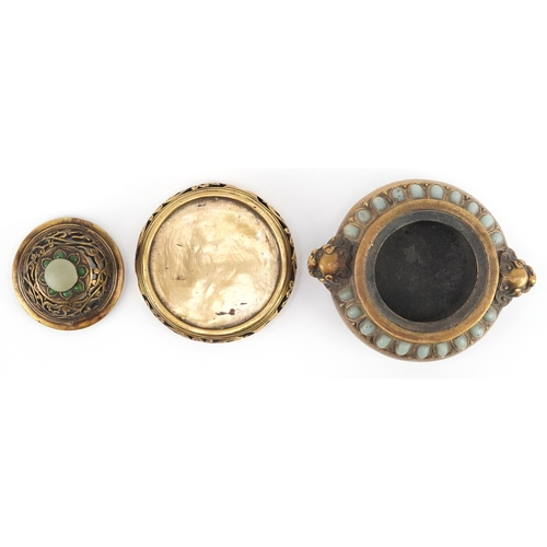 50 - Chinese patinated bronze censer and cover having applied cabochon green stones and Foo dog handles, ... 