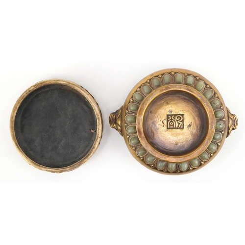 50 - Chinese patinated bronze censer and cover having applied cabochon green stones and Foo dog handles, ... 