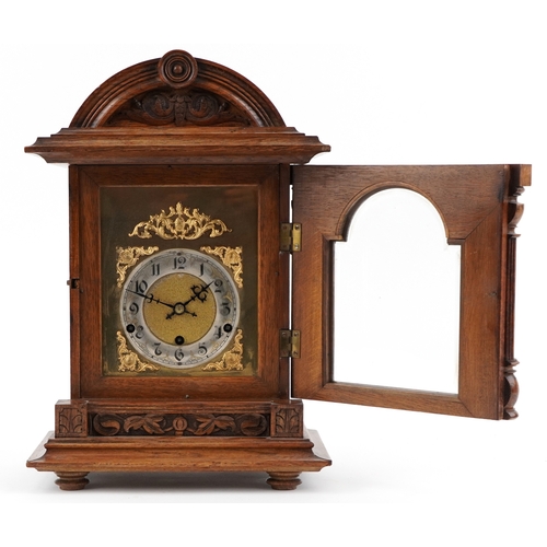 78 - Early 20th century German oak cased bracket clock having gilt dial, silvered chapter ring with Arabi... 