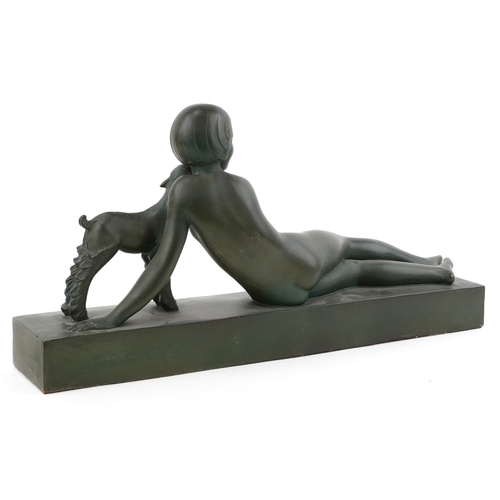 105 - Art Deco verdigris terracotta model of a recumbent nude female with a lamb, 70cm wide