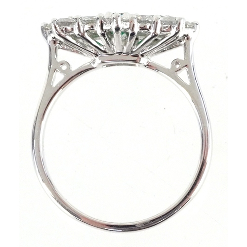 3041 - Platinum round brilliant cut diamond and step cut emerald cluster ring, total diamond weight 1.19 ca... 