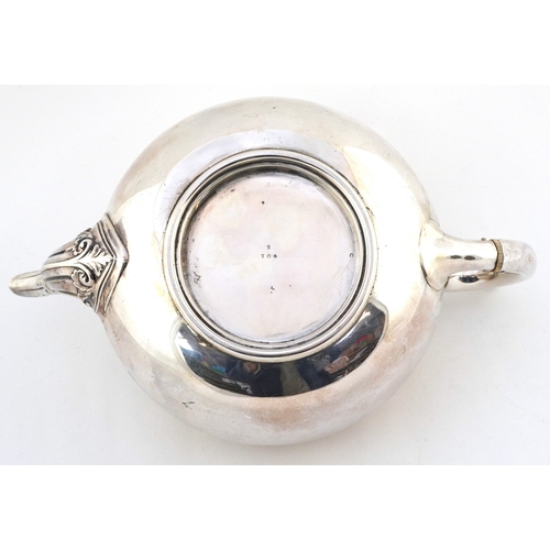 467 - James Dixon & Son Ltd., Edwardian silver pumpkin shaped teapot with embossed foliate decoration, She... 