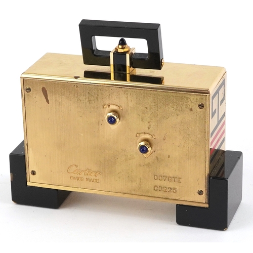 81 - Must de Cartier, Art Deco style Pendulette enamelled and lacquered alarm clock, numbered 891403208, ... 
