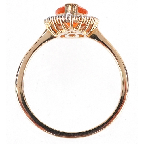 3055 - 9K gold orange stone and baguette cut diamond marquis ring, possibly fire opal, size O, 2.4g.