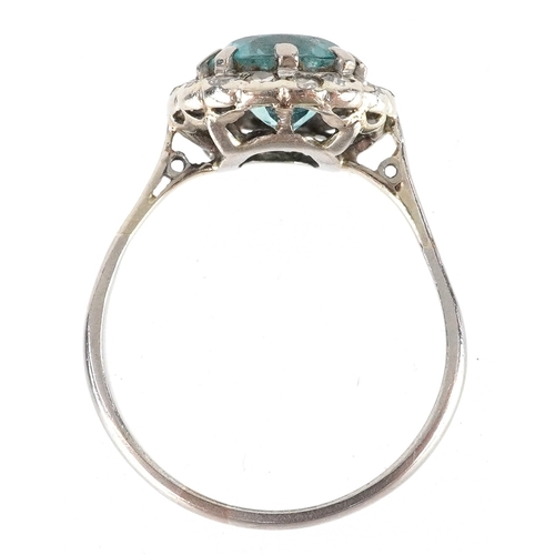 3049 - 18ct white gold diamond and blue stone cluster ring, size O, 2.9g.