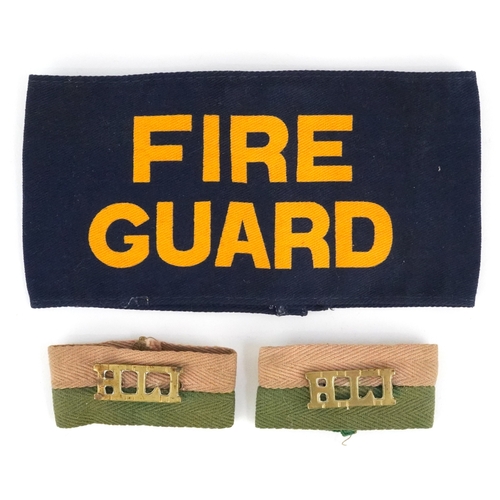Pair of military interest shoulder titles and a Fire Guard armband.