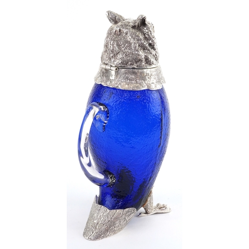 1028 - Novelty blue glass and silver plated claret jug in the form of an owl, 29cm high.