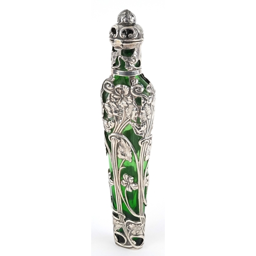 497 - Large silver overlaid green glass scent bottle pierced and embossed with stylized flowers, SJ maker'... 