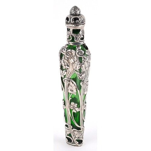 497 - Large silver overlaid green glass scent bottle pierced and embossed with stylized flowers, SJ maker'... 