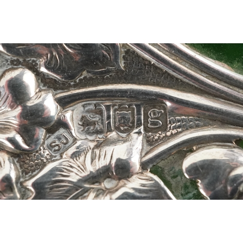 497 - Large silver overlaid green glass scent bottle pierced and embossed with stylized flowers, SJ maker'... 