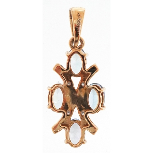 3054 - 10K gold blue/green stone and diamond pendant, tests as tanzanite, 2.8cm high, 2.2g.