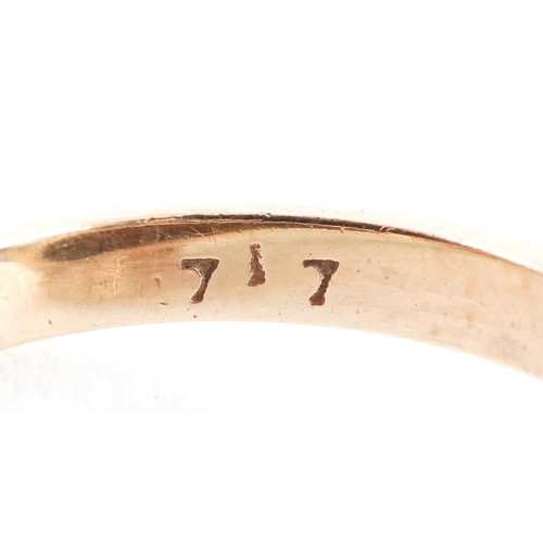 3047 - 9ct gold ring in the form of a fish with pink stone eyes, size I, 3.8g.