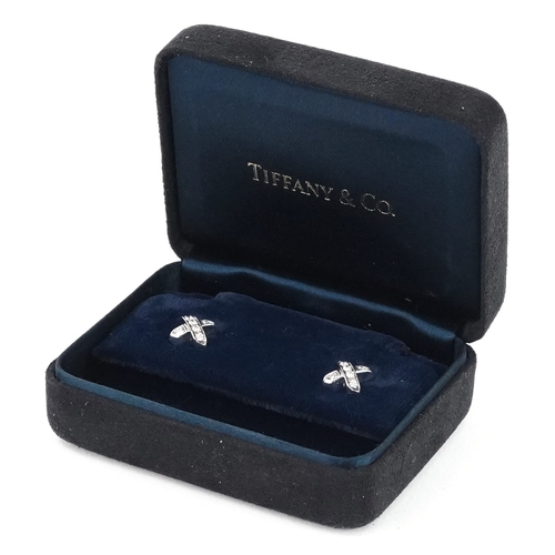 3003 - Tiffany & Co., pair of 18ct white gold diamond cluster stud earrings, 8.6mm in diameter, total 5.5g,... 