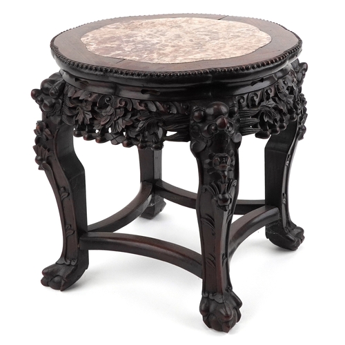 53 - Chinese carved hardwood plant stand with inset marble top, raised on ball and claw feet, 46cm high x... 