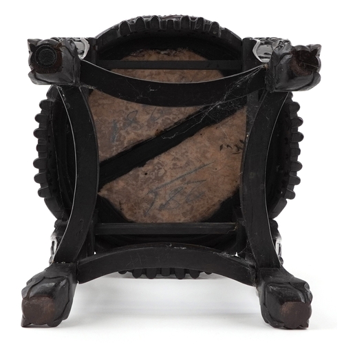 53 - Chinese carved hardwood plant stand with inset marble top, raised on ball and claw feet, 46cm high x... 