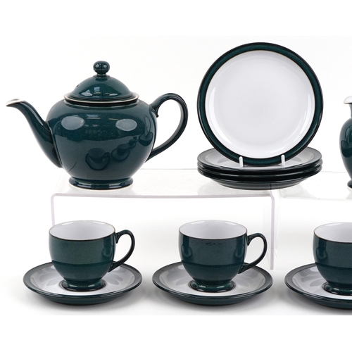 1055 - Denby pottery tea service including four teacups and saucers, teapot and milk jug, the largest 17cm ... 