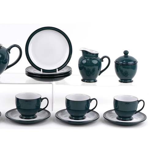 1055 - Denby pottery tea service including four teacups and saucers, teapot and milk jug, the largest 17cm ... 