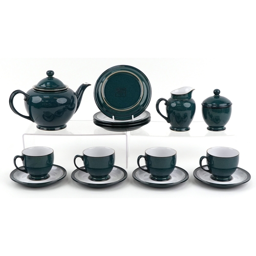 1055 - Denby pottery tea service including four teacups and saucers, teapot and milk jug, the largest 17cm ... 