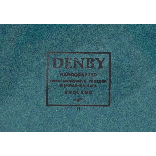 1055 - Denby pottery tea service including four teacups and saucers, teapot and milk jug, the largest 17cm ... 